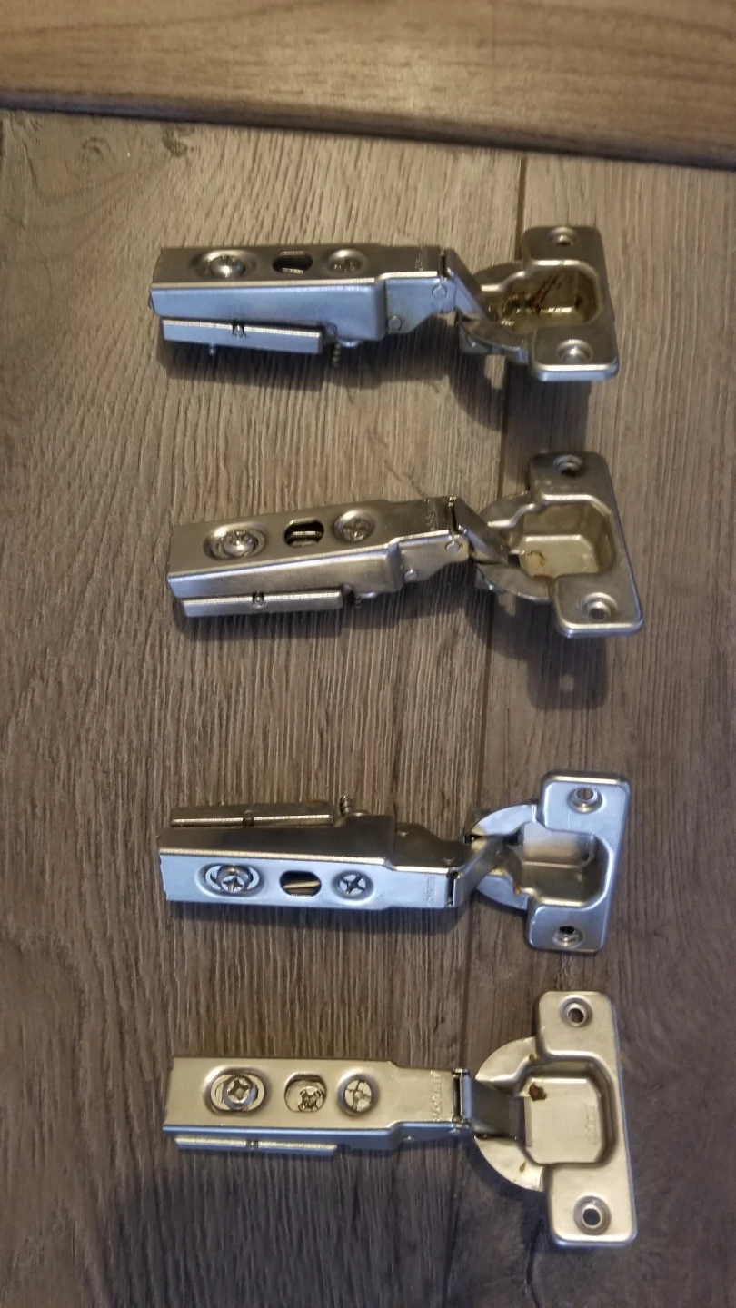 Four Cabinet Hinges
