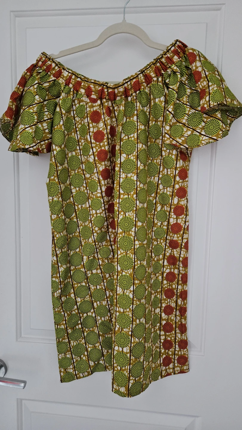 Off-the-shoulder dress with African print
