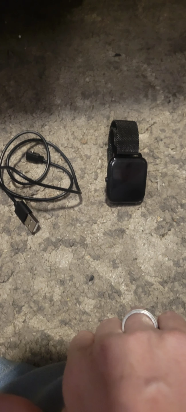 Black Smartwatch with Mesh Band and Charger