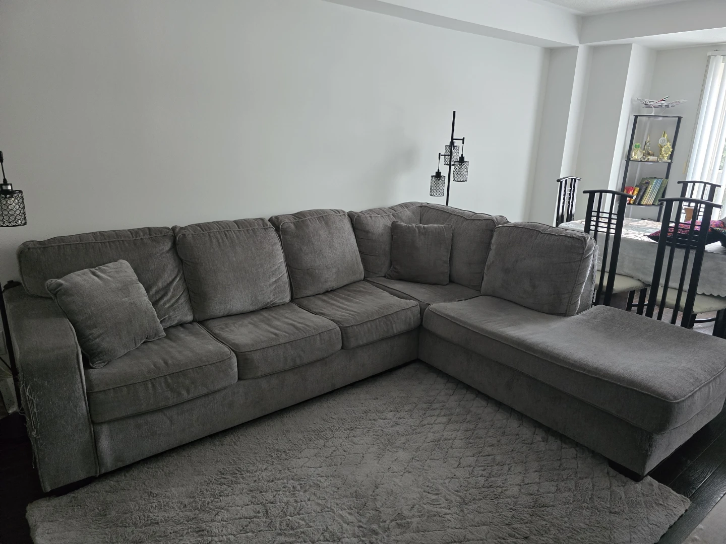 Grey Ashley sectional with chaise and pull-out sleeper. - photo 3