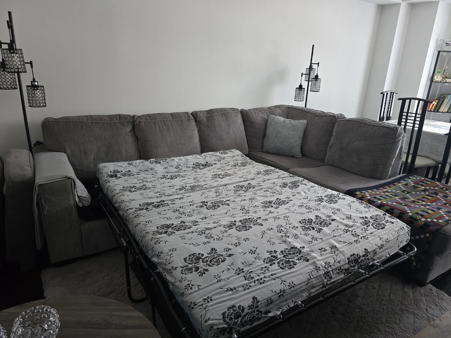 Grey Ashley sectional with chaise and pull-out sleeper. - photo 5