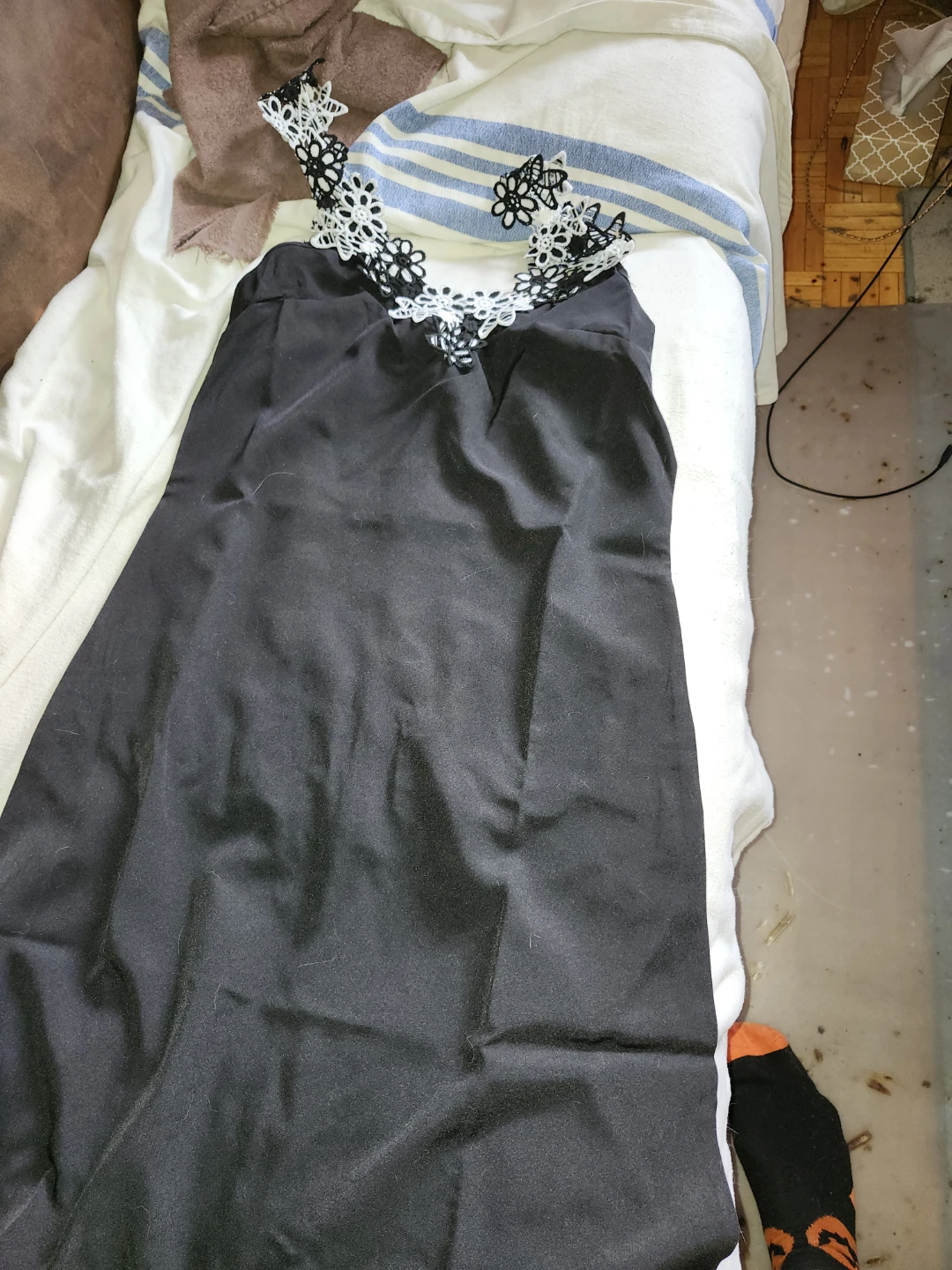 Black slip dress with lace trim
