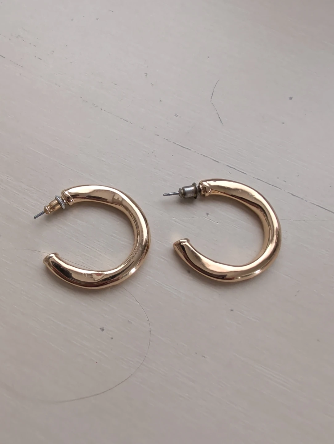 Gold tone hoop earrings