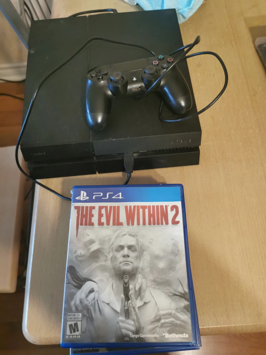 PlayStation 4 Console with Controller and Games