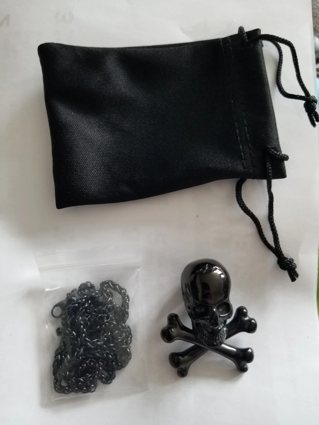 Skull and Crossbones Pendant Necklace with Pouch