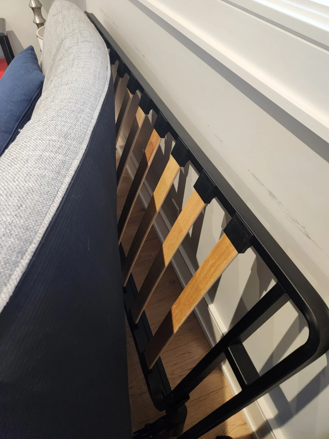 Grey futon with Two Blue Pillows - photo 3