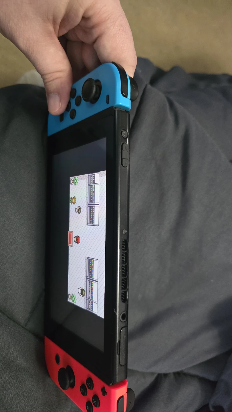 Nintendo Switch Console with Neon Red and Blue Joy-Cons