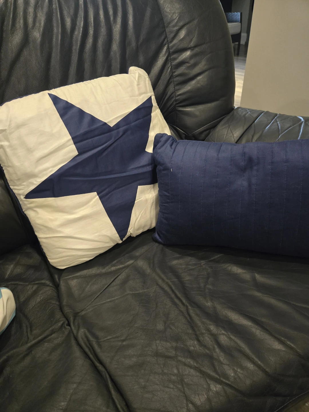 Throw Pillow with Blue Star Design