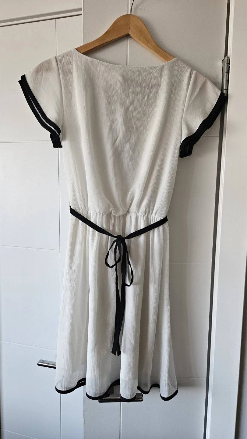 White dress with black trim and bow tie - photo 2
