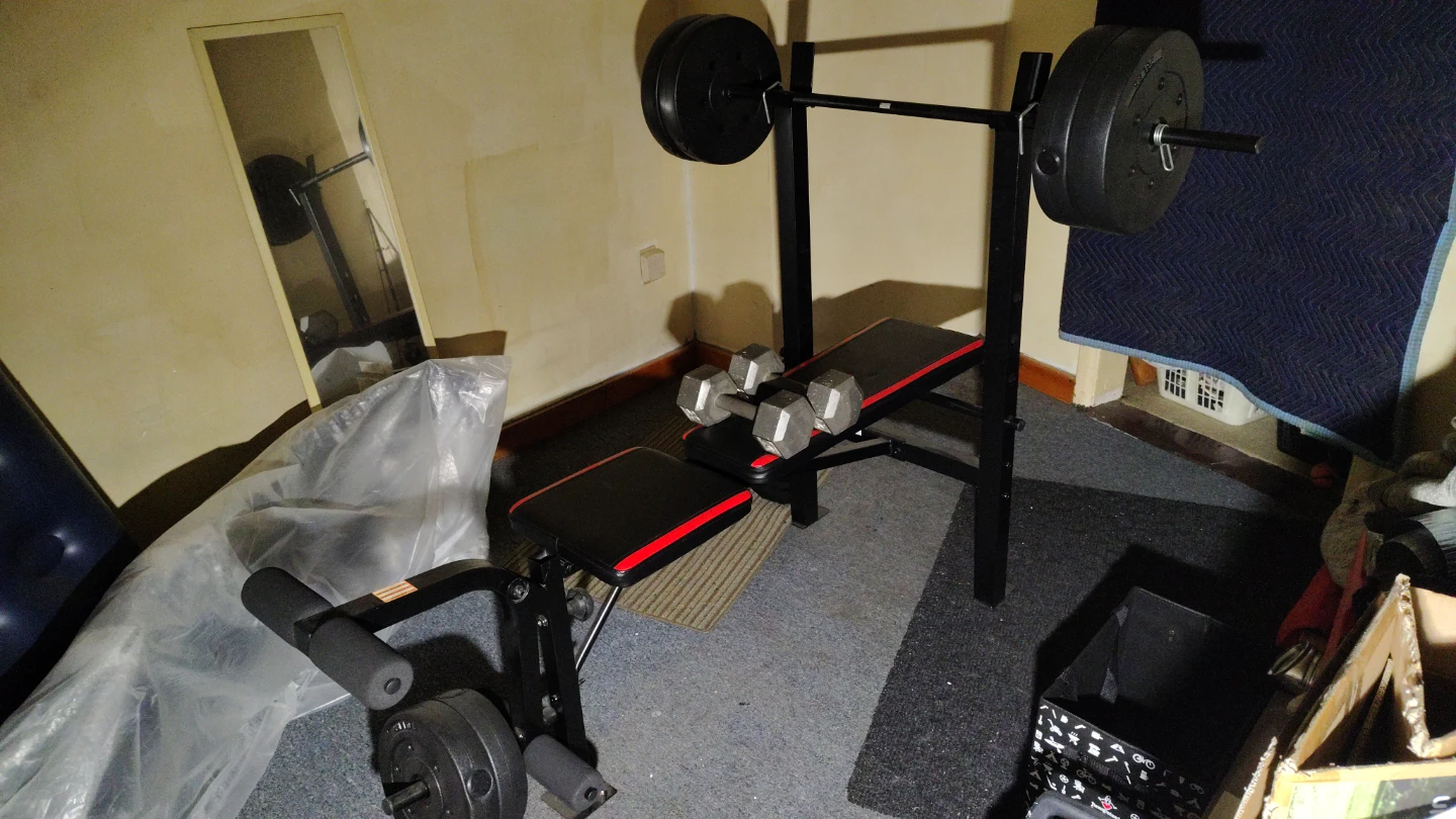 Weight Bench with Barbell and Dumbbells