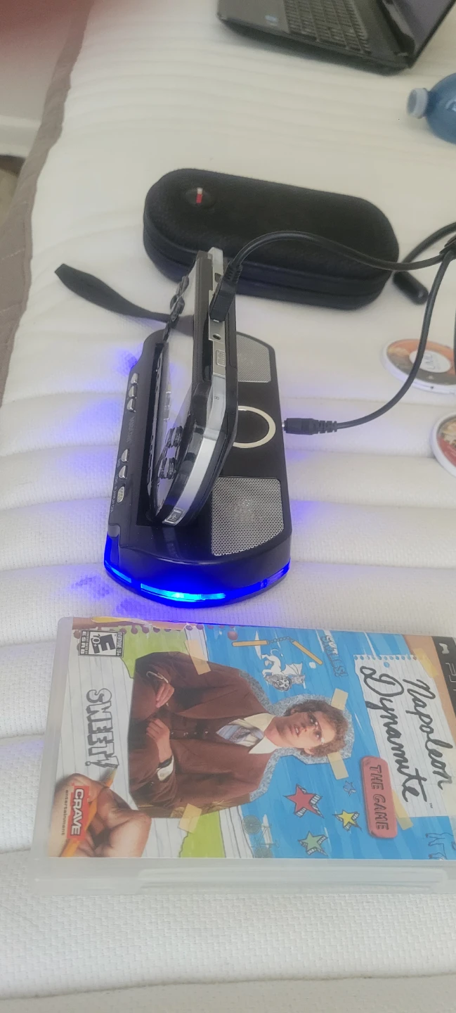 Sony PSP  with MadCatz Dock and Games - photo 3