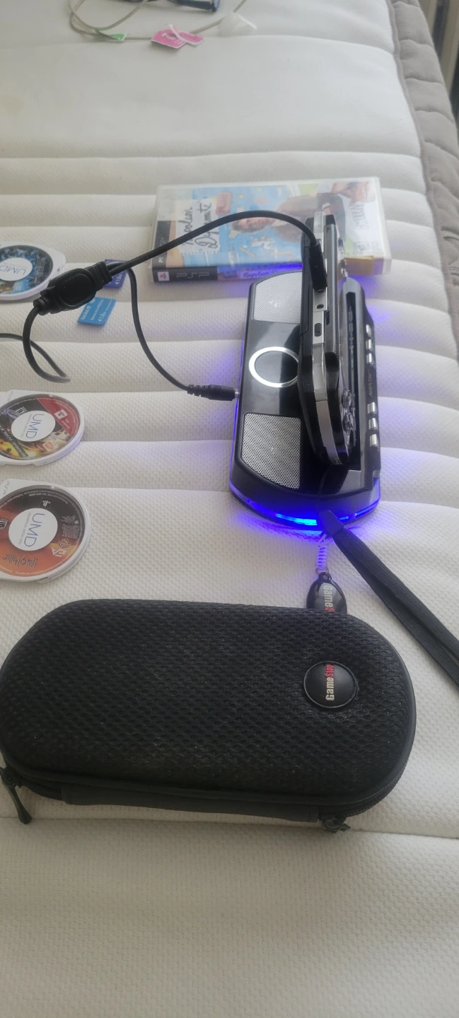 Sony PSP  with MadCatz Dock and Games - photo 4