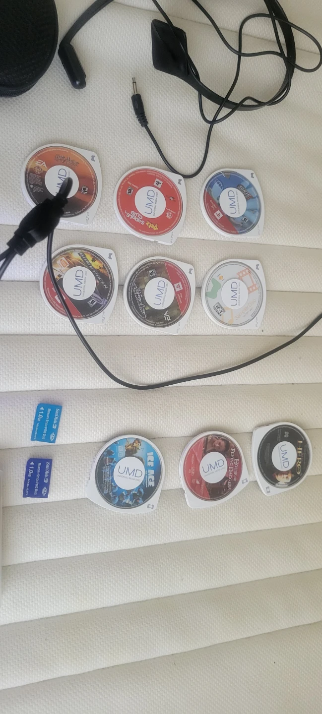 Sony PSP  with MadCatz Dock and Games - photo 5