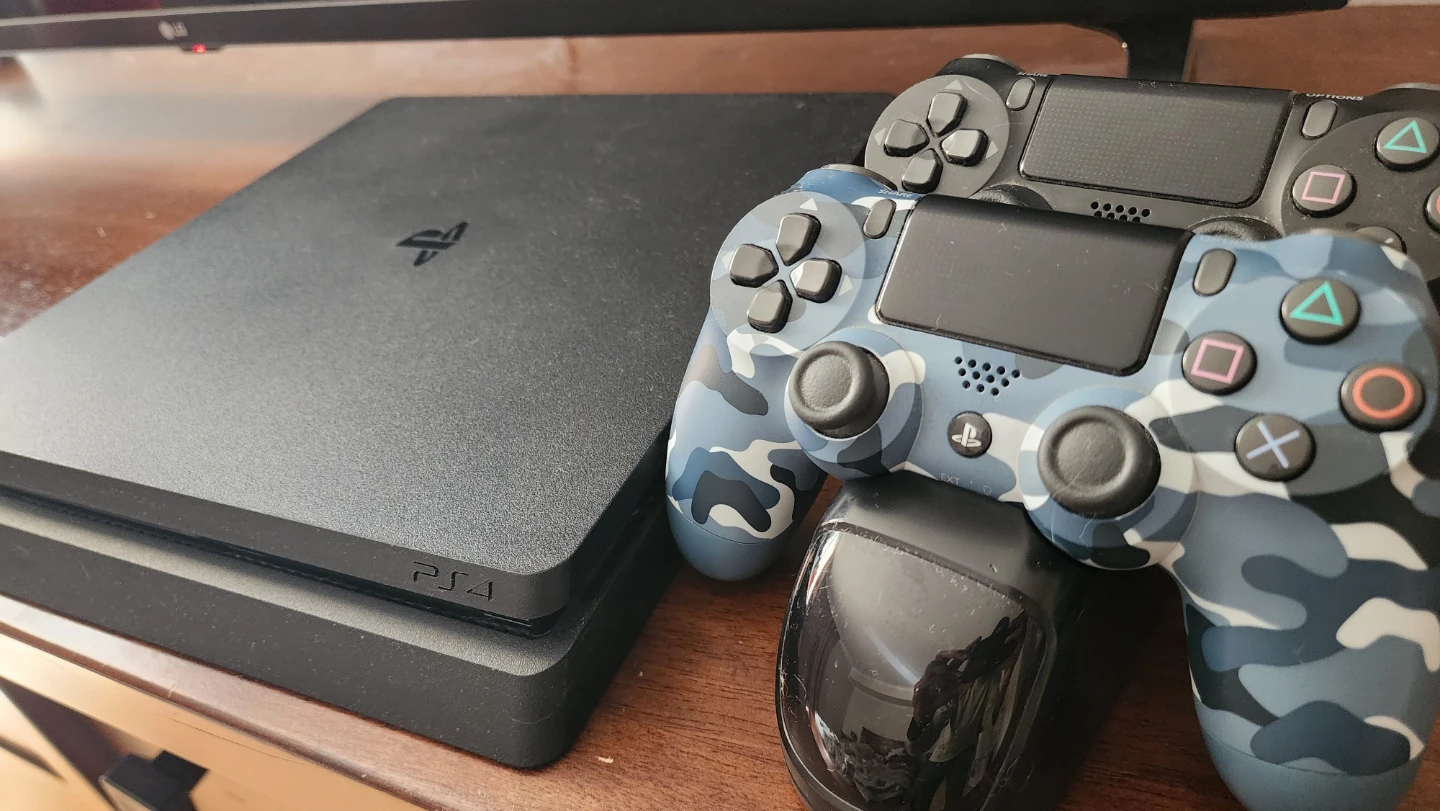 PS4 with controllers and charger for sale
