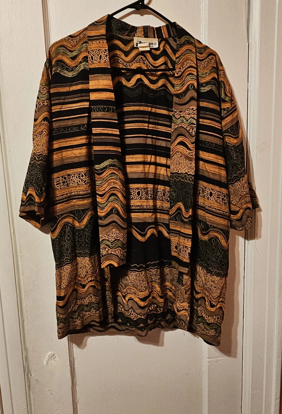 Women's long opened front shirt
