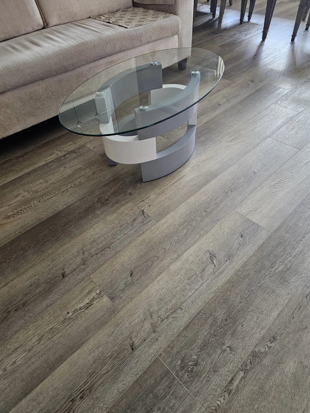 Oval Glass Top Coffee Table with Modern Base