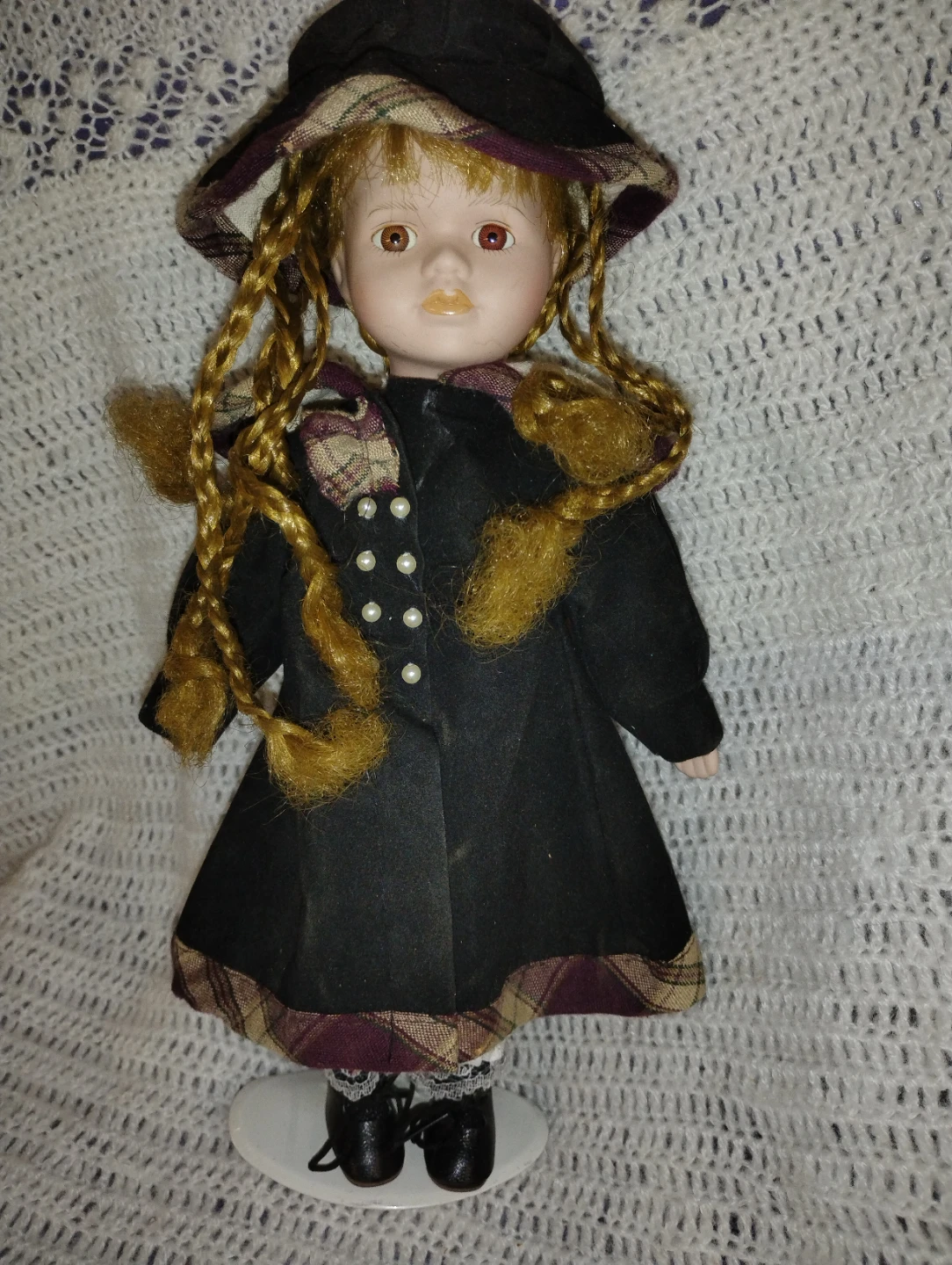 Vintage Porcelain Doll with Black Coat and Hat