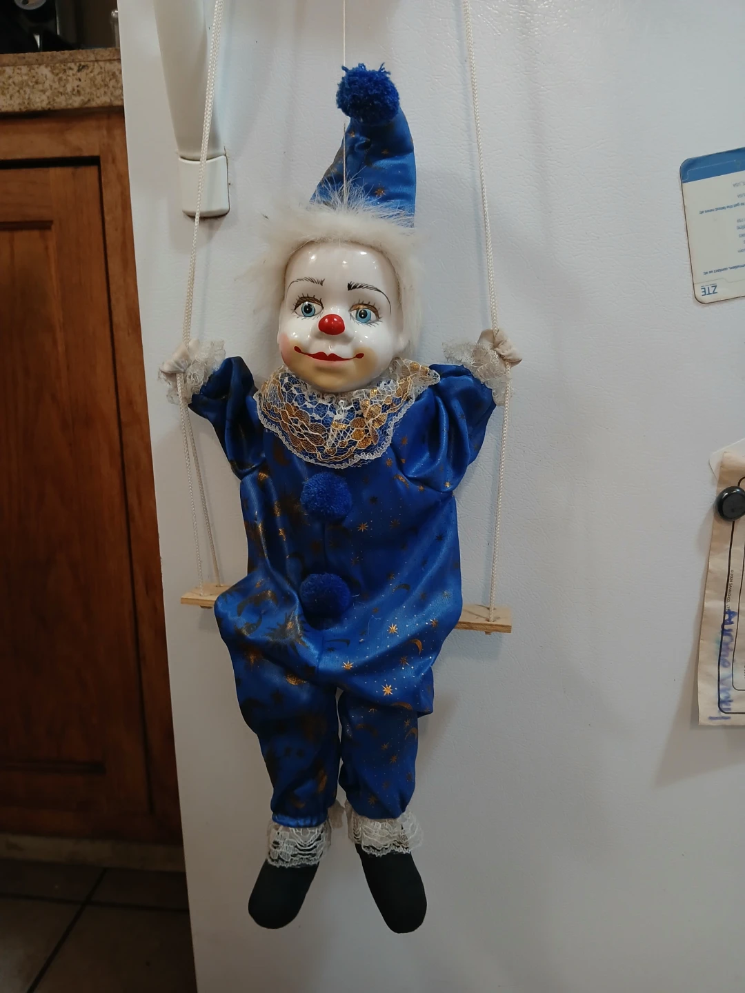 Vintage Clown Doll on a Swing