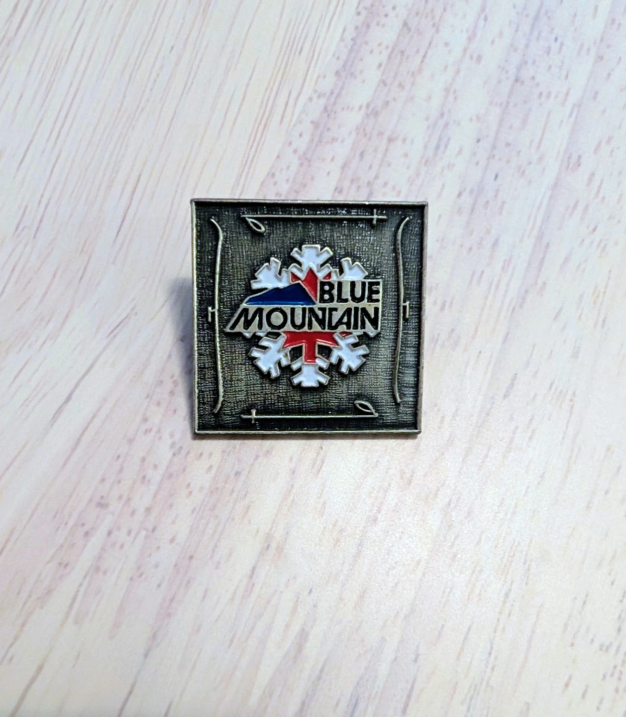 Brand New Blue Mountain Lapel Pin
