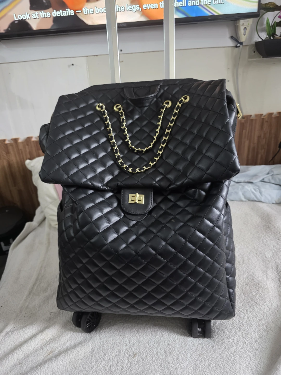 Black Quilted Rolling Backpack with Gold Chain - photo 5