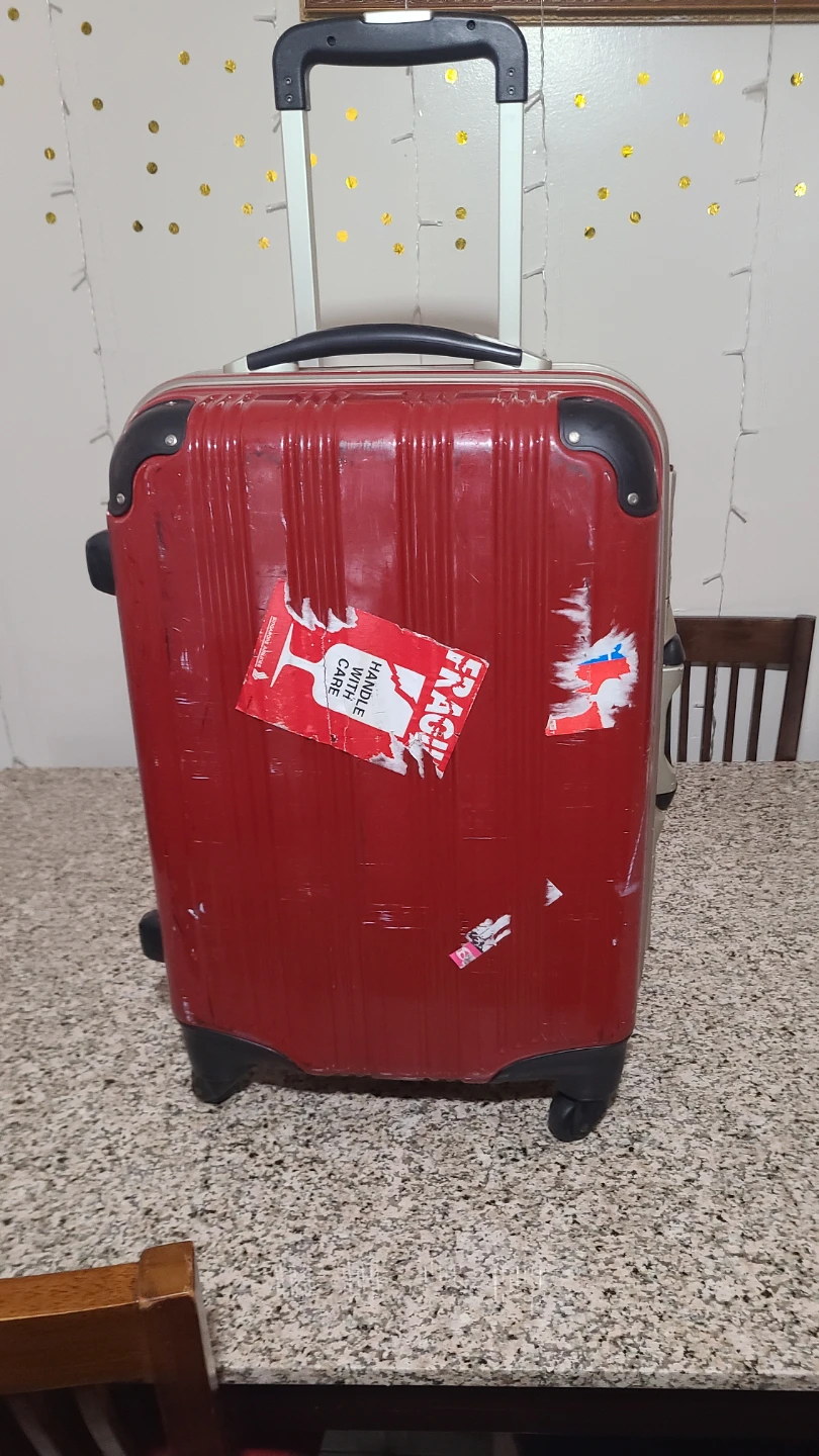 Red Rolling Suitcase