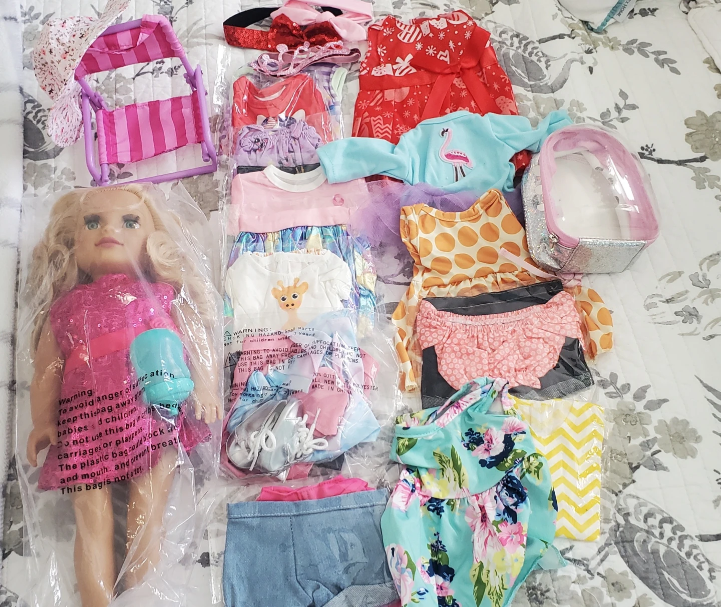 Doll with Assorted Outfits and Accessories