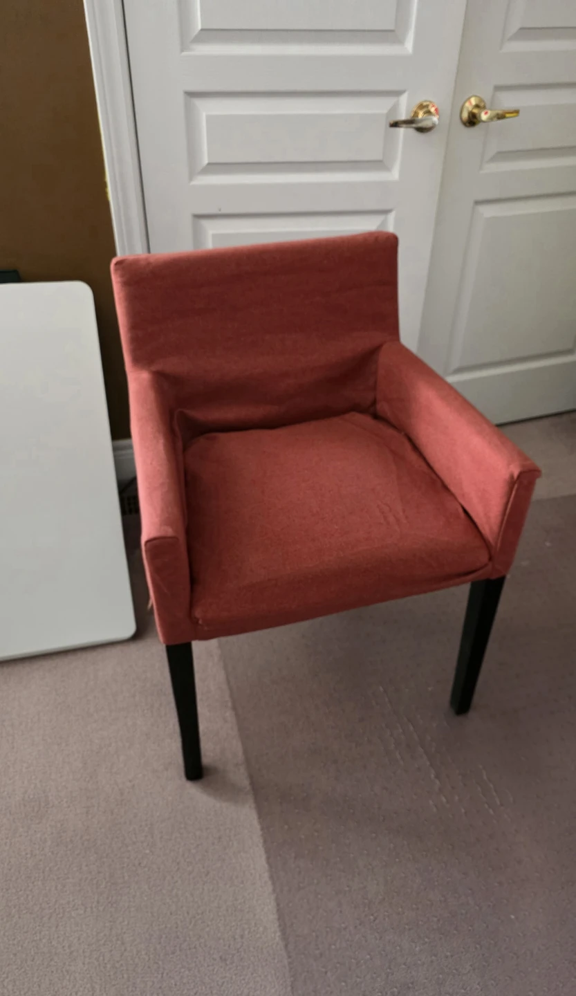Bold red accent chair – perfect aesthetic for any room!