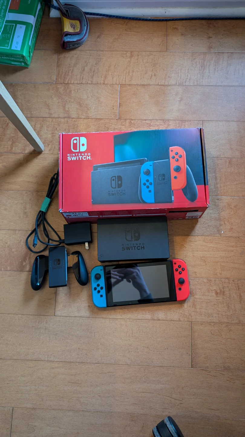 Nintendo Switch Console with Neon Red and Blue Joy-Cons