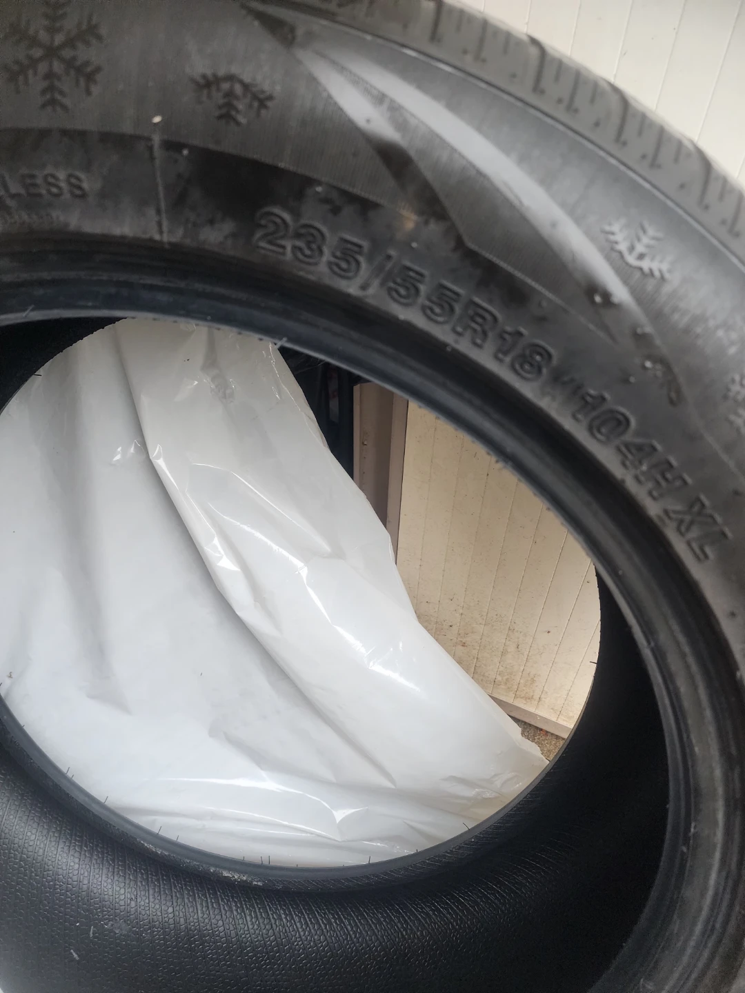 235/55R18 104H XL Tire