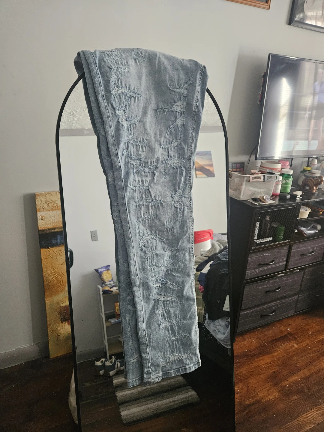 Distressed Light Wash Denim Jeans