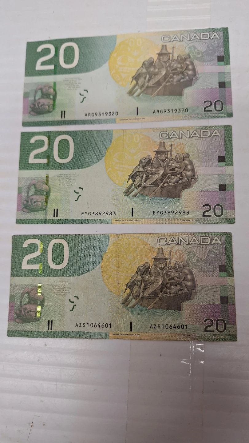 Three Canadian $20 Bills (2004) - photo 2