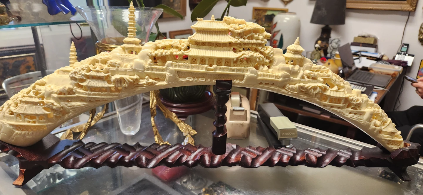 Carved Ivory Tusk Sculpture