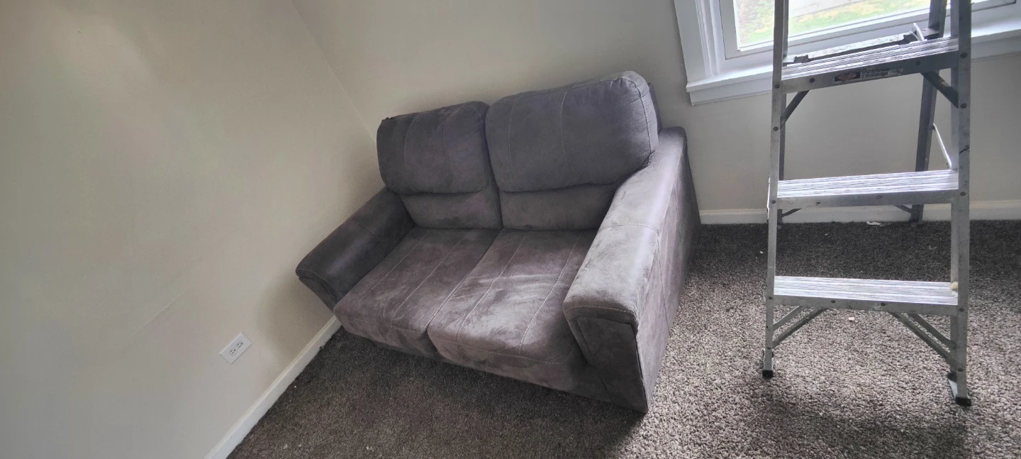 Gray loveseat sofa
