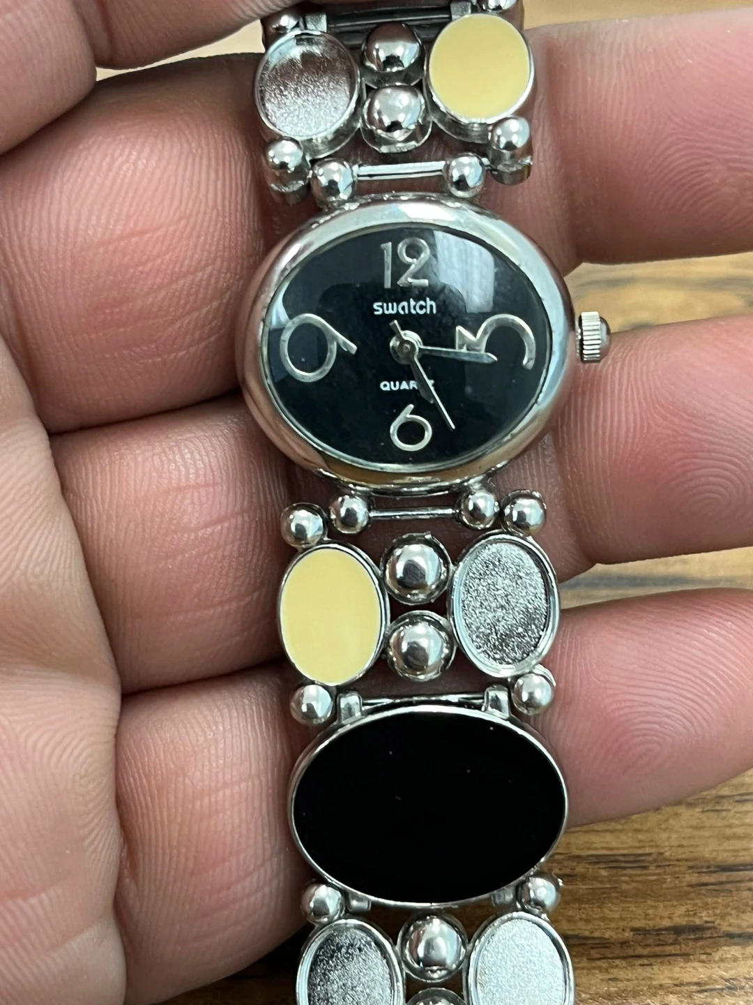 Swatch Quartz Watch with Black and Yellow Accents