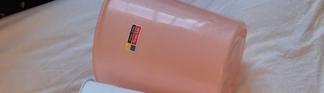 Pink Plastic Trash Bin