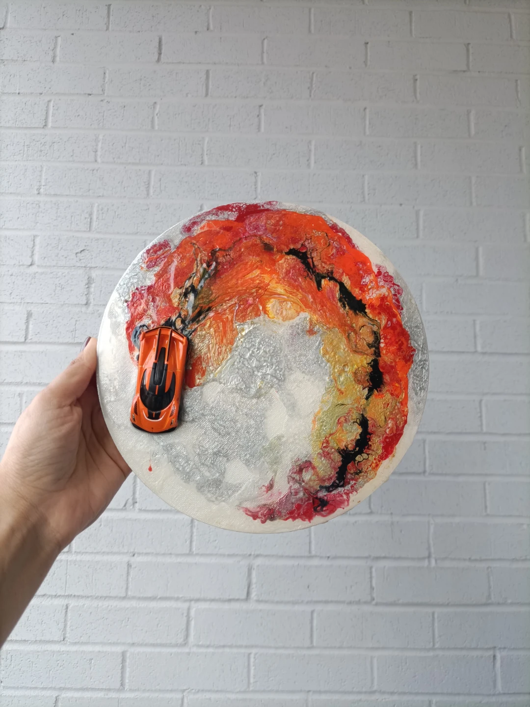Round Art Piece with Orange Toy Car with resin coating - photo 2