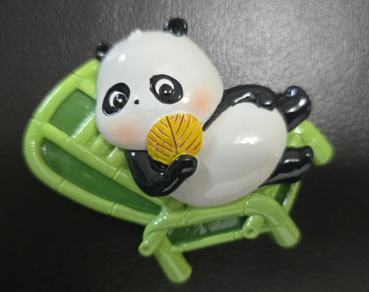Cute Panda Relaxing on a Green Chair Fridge magnet