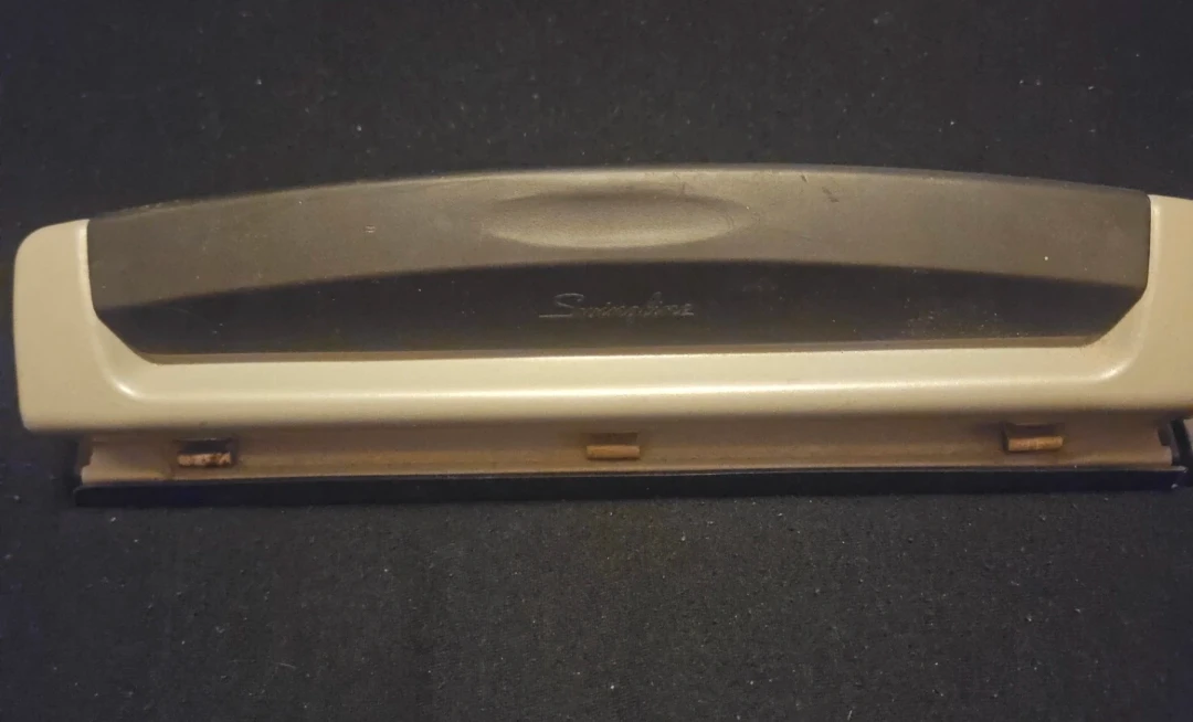Black & Silver Swingline 3 Hole Puncher