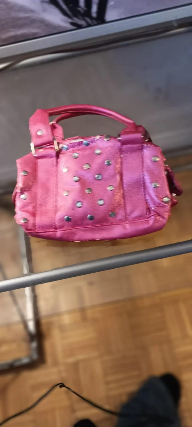 Pink studded handbag