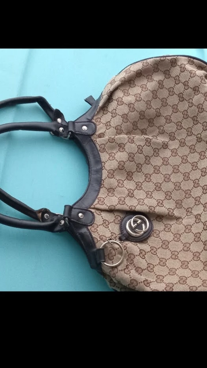 Gucci GG Monogram Canvas Shoulder Bag - photo 2
