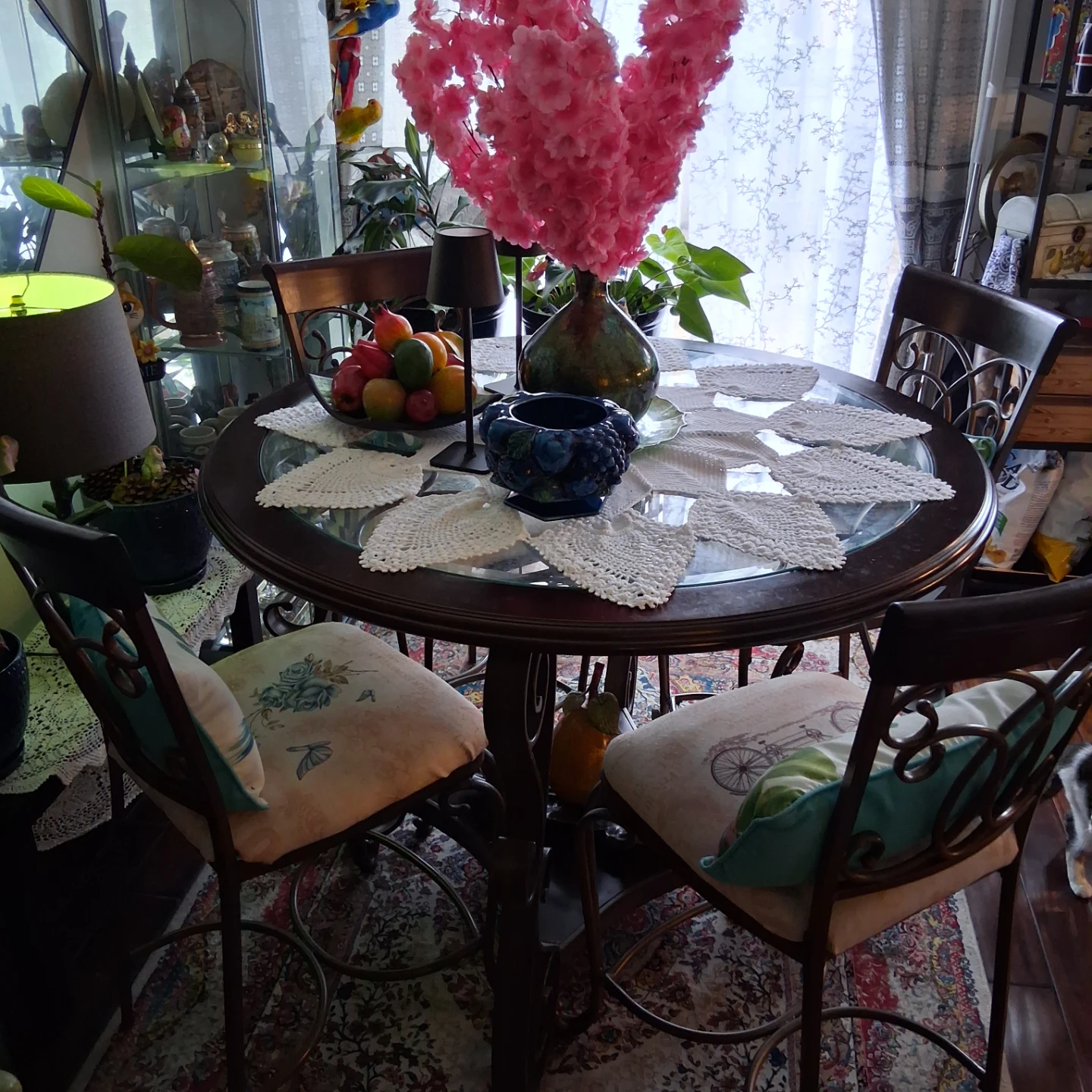 Fur Forge Round glass top table with four chairs