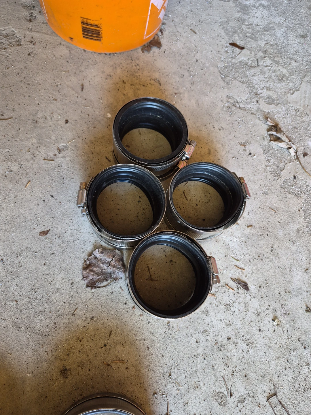 Assorted Hose Clamps and Pipe Fittings