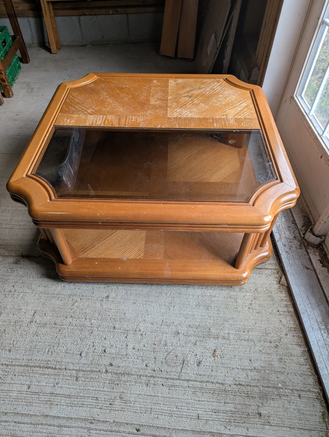 Wooden coffee table with glass top