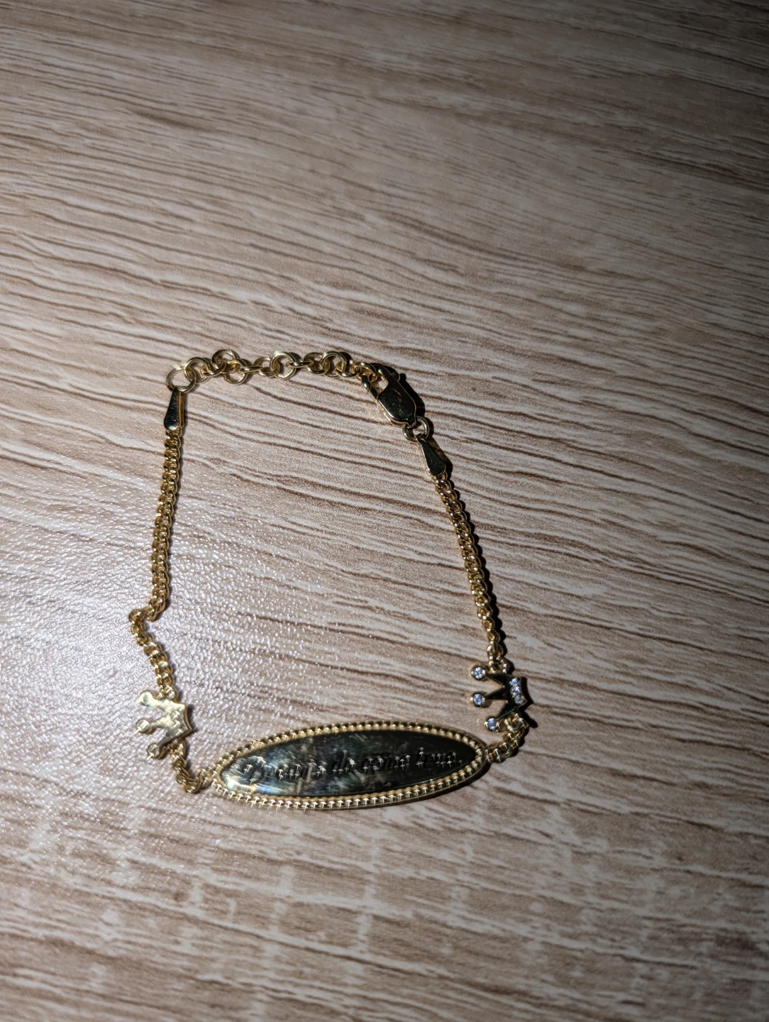 Gold Tone Adjustable Bracelet with Engraved Oval Charm