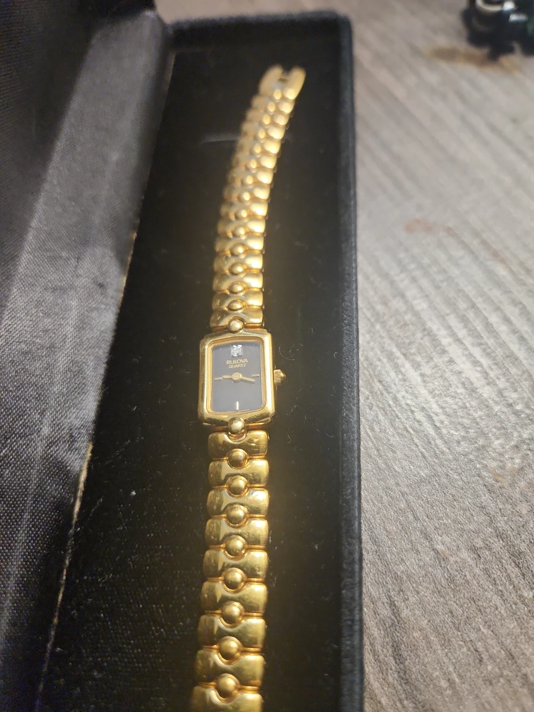Bulova Women's Gold Tone Quartz Watch with Blue Dial