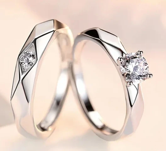 Pair of Sterling Silver Diamond Rings