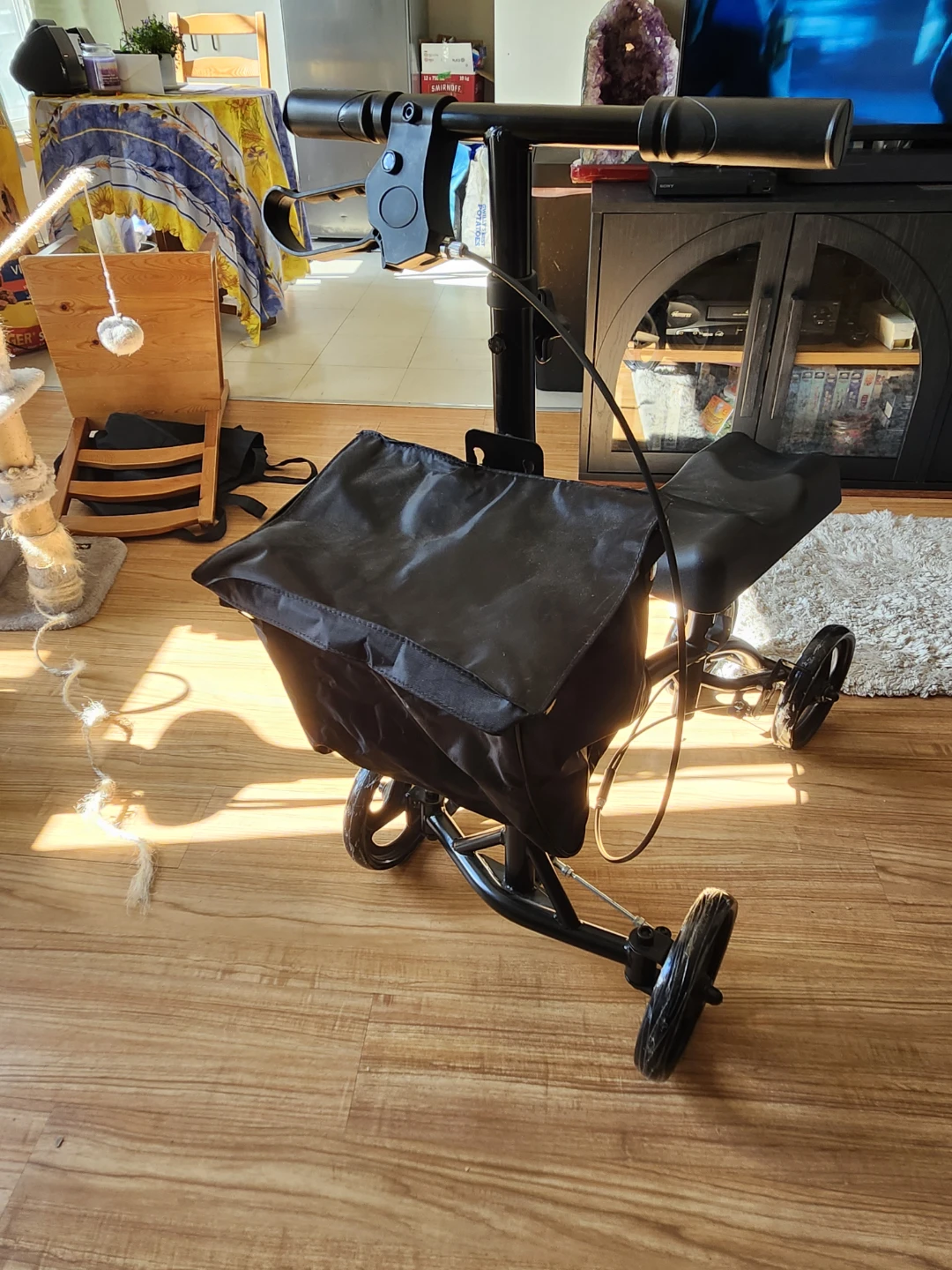 Three wheeled black Knee Scooter to assist with mobility - photo 2