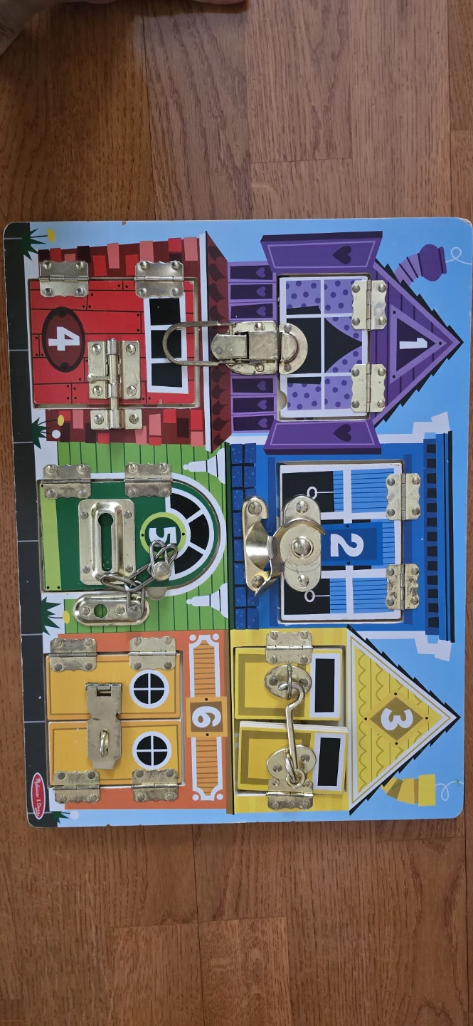Melissa & Doug Wooden Activity Board with Latches