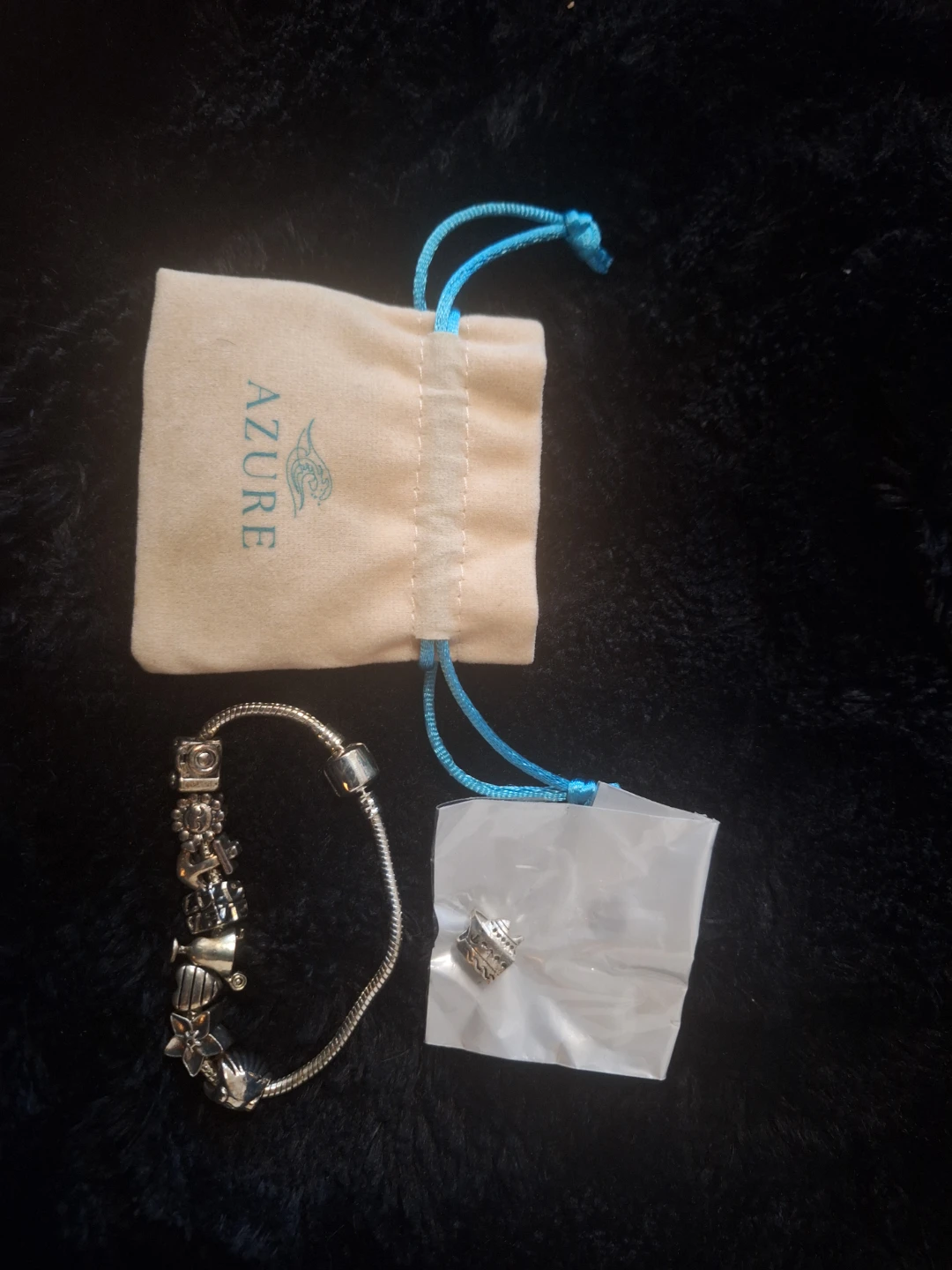 Azure Charm Bracelet with Multiple Charms