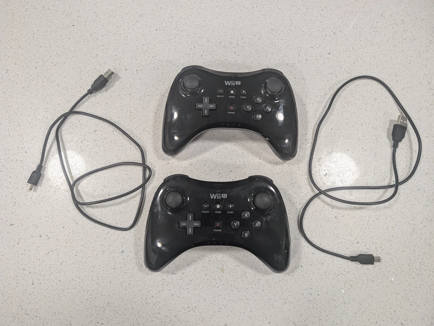 Wii U controllers with USB charge cords